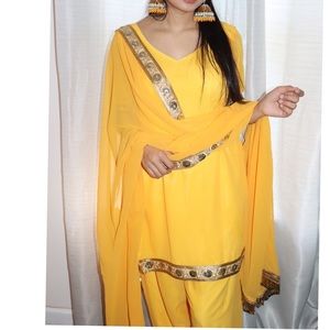 Yellow suit with panjabi designs pants
